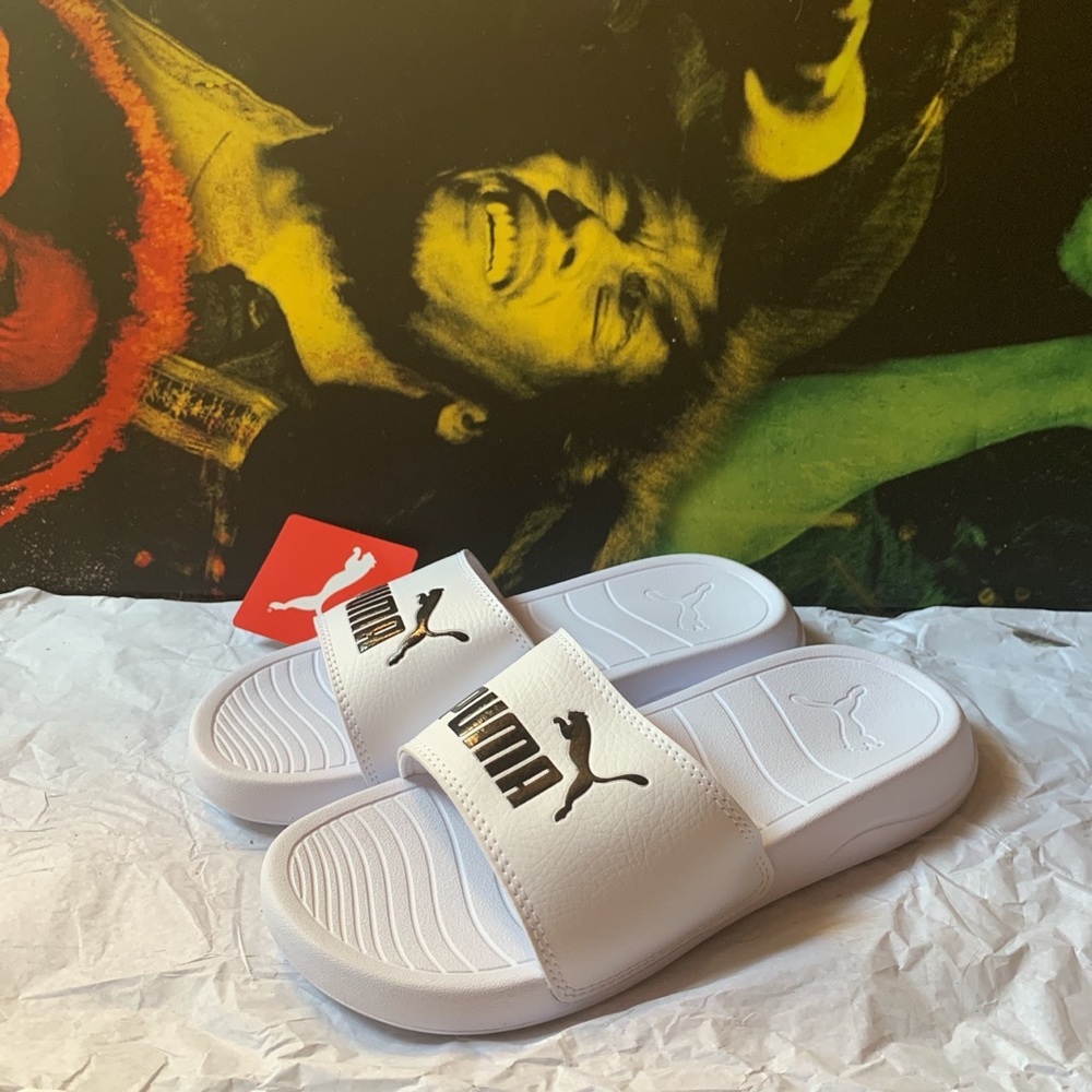 Puma Slides size 4